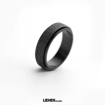 Titanium steel ring, matte rotating ring for men and women, simple, unique, cold style, small niche, simple ring for men with temperament.
